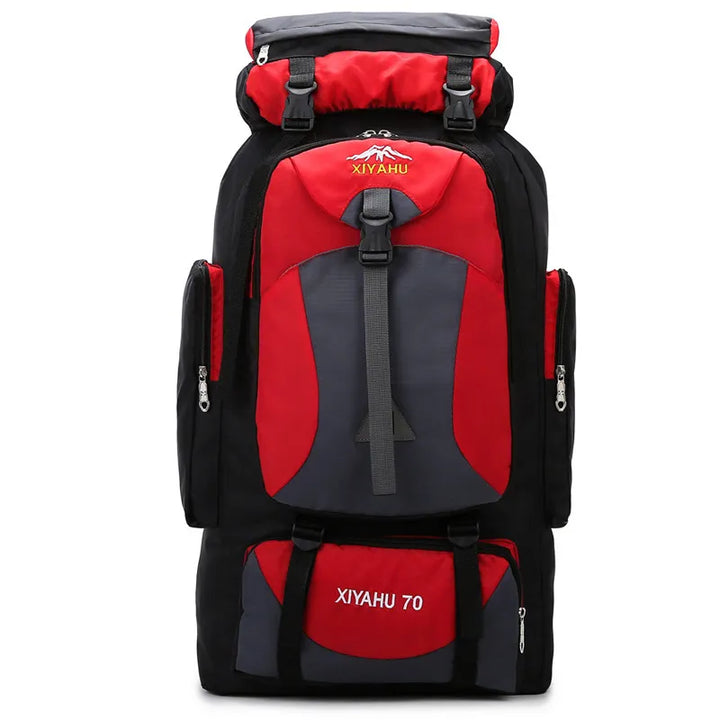 Sac à dos de randonnée Xiyahu rouge affiché en vue latérale avec fermeture éclair centrale et détails de sangles noirs.