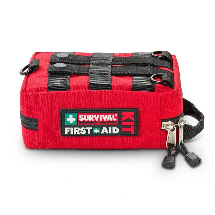 Kit de premiers secours rouge vu de côté avec logo "SURVIVAL", fermeture éclair double et système de fixation MOLLE.
