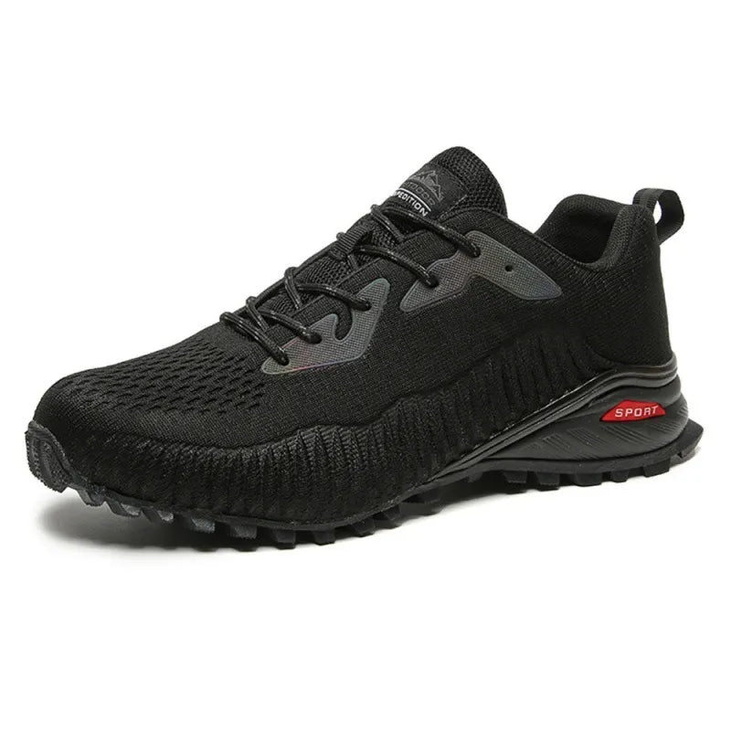  Chaussure de randonnée basse noire en tissu respirant avec semelle crantée.