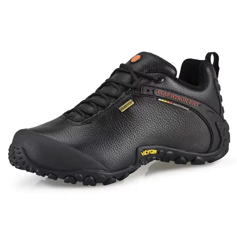 Chaussure de randonnée homme en cuir noir véritable, semelle Vibram antidérapante et membrane Gore‑Tex imperméable, idéale pour trekking, bivouac et marche en montagne.