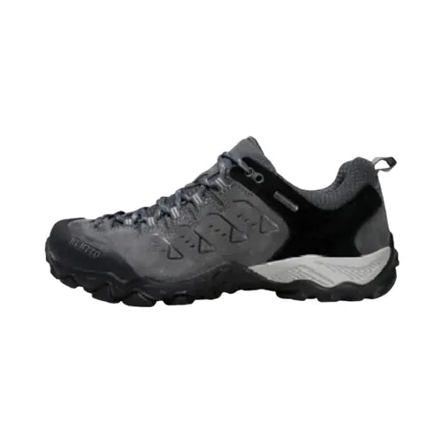 Chaussure de randonnée homme couleur gris anthracite, semelle antidérapante et tige résistante, idéale pour trekking, marche et activités outdoor.