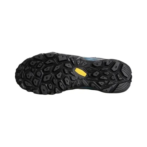 Semelle antidérapante Vibram de chaussure de randonnée Humtto, crampons multidirectionnels offrant une excellente adhérence sur terrain accidenté.