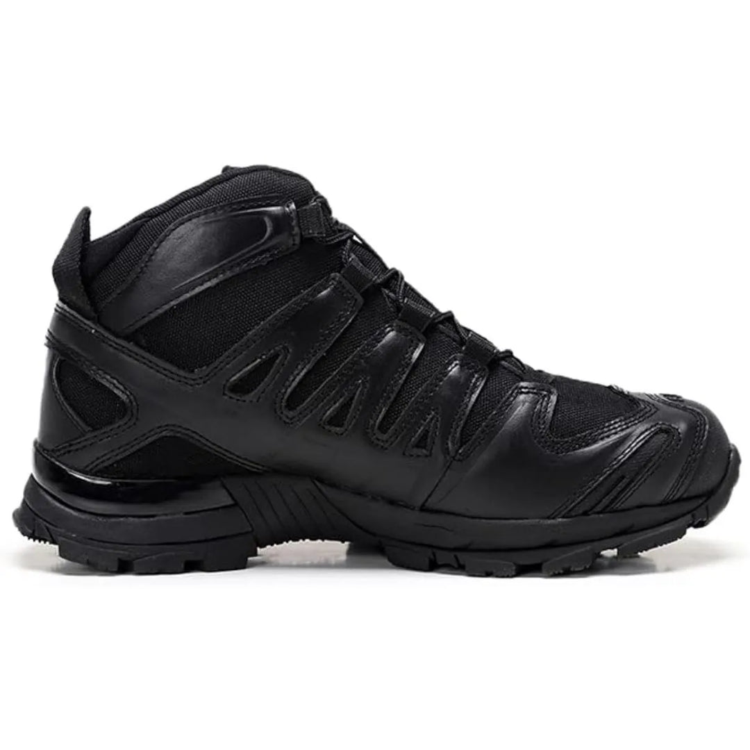 Chaussure de randonnée tactique noire mi-haute en cuir et textile.