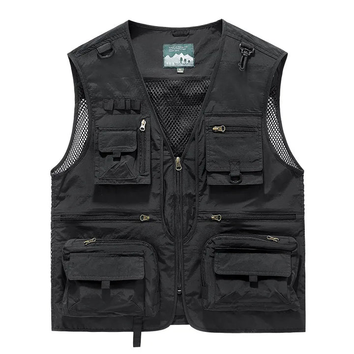 Gilet de randonnée noir à multiples poches avec filet respirant pour équipement outdoor.