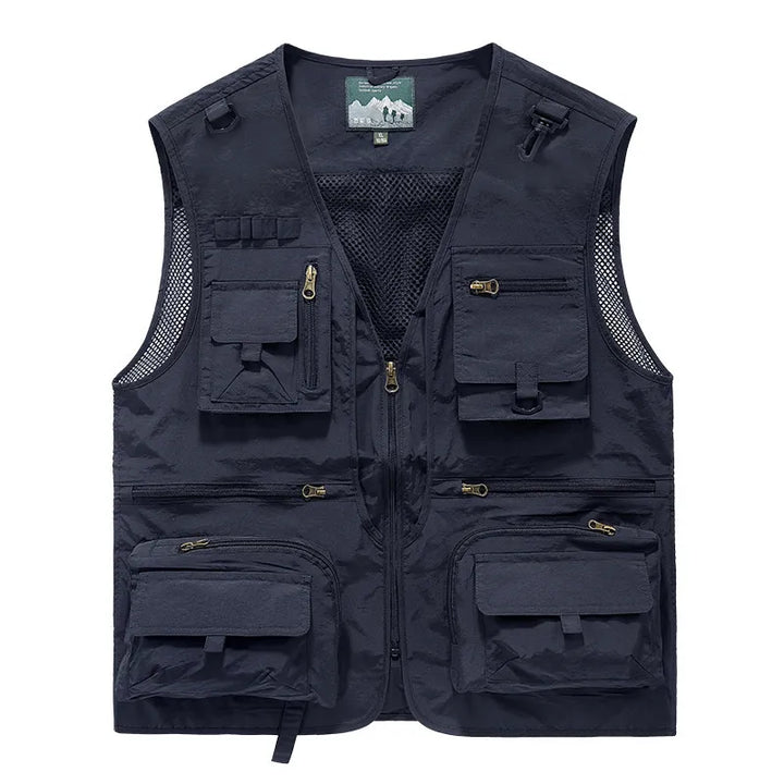 Gilet de randonnée bleu marine avec nombreuses poches de rangement, idéal pour la survie et le bivouac.