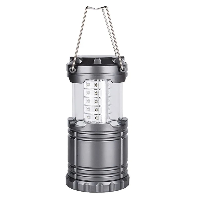 Lampe de camping LED pliable couleur grise. Parfaite pour les activités outdoor.