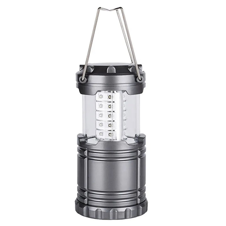Lampe de camping LED pliable couleur grise. Parfaite pour les activités outdoor.