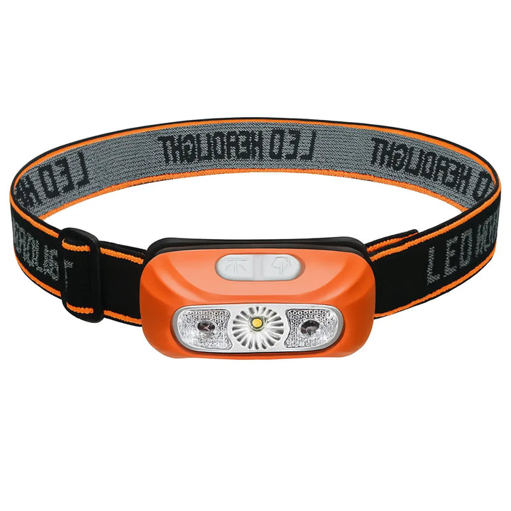 Lampe frontale LED pour camping couleur orange.