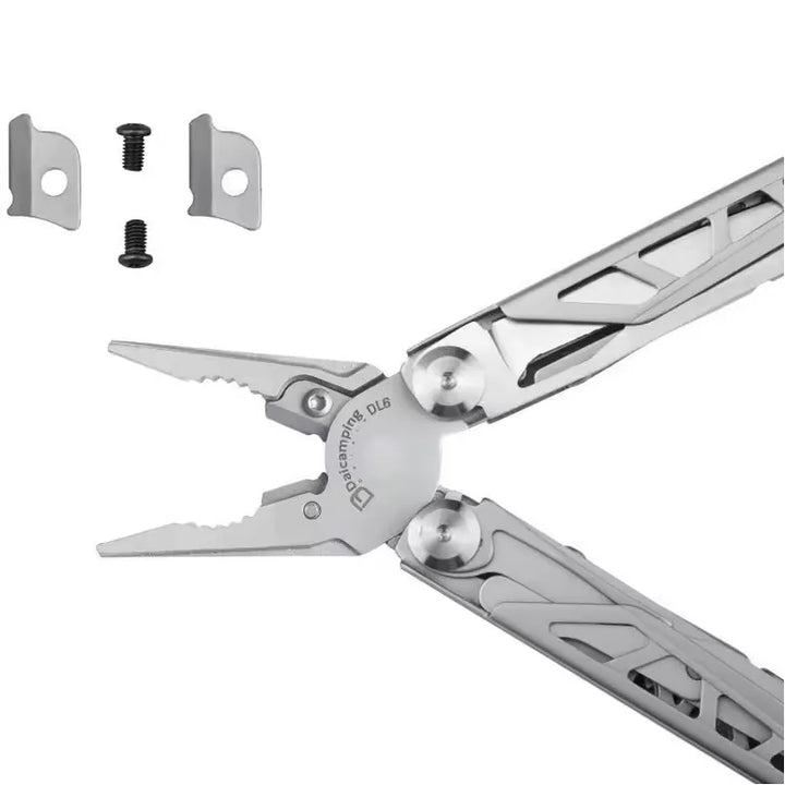 Pince multifonction pliante en acier inoxydable avec coupe‑fil et lames intégrées, idéale pour le camping, le bricolage et les activités de plein air, livrée avec petites pièces de rechange.