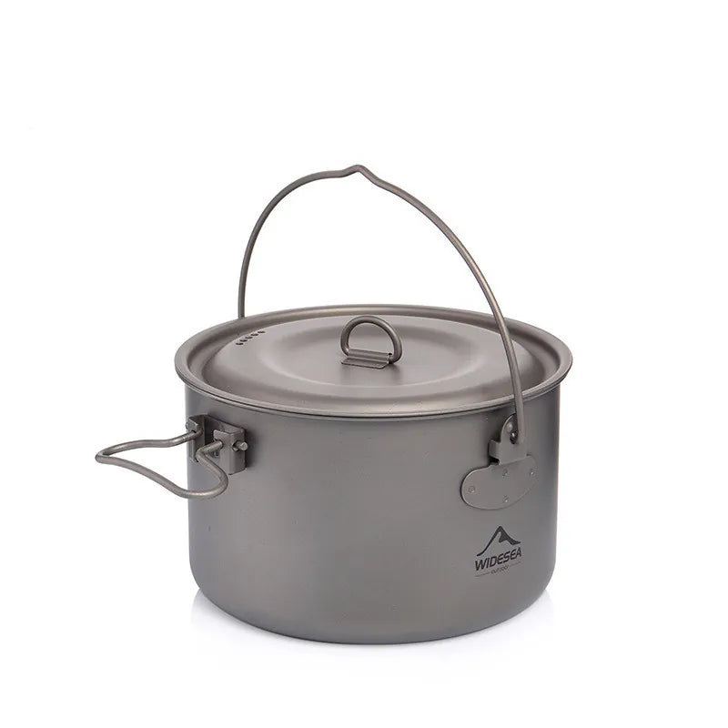 popote titane compacte avec poignée pliable et anse pour feu de bois, idéale en randonnée et bivouac