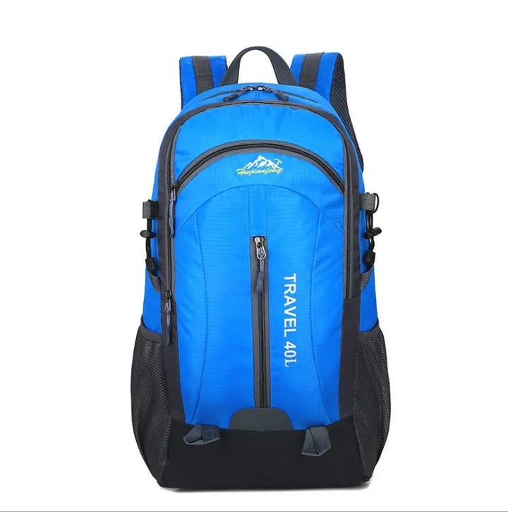 Sac à dos de randonnée 40L en tissu déperlant, coloris bleu et noir.