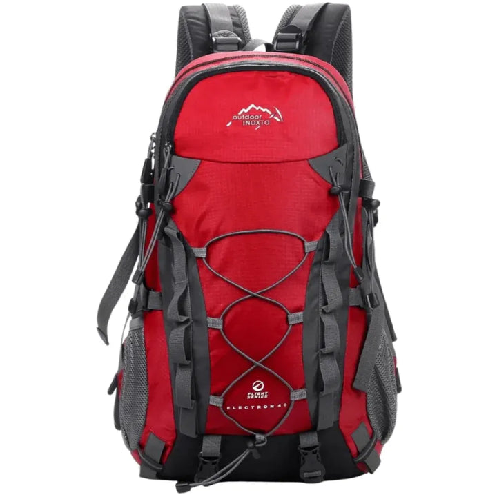 Sac à dos de randonnée 40 L rouge, ergonomique et résistant, idéal pour trekking, camping et bivouac.