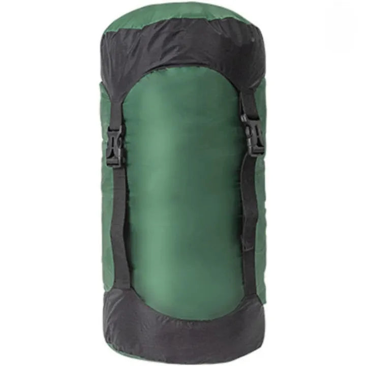 sac de compression vert pour randonnée et bivouac, modèle compact avec sangles latérales