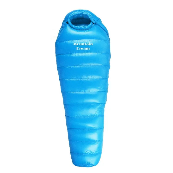 Sac de couchage bleu compact pour randonnée légère.