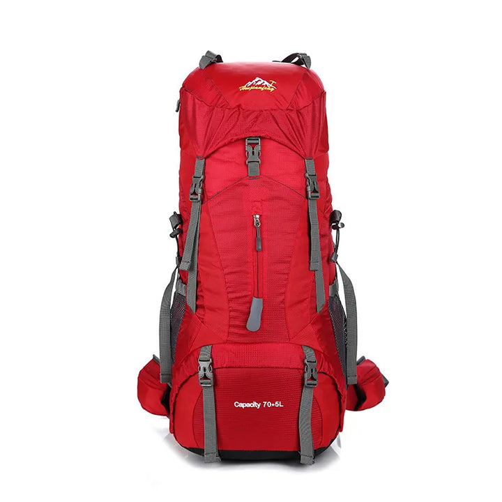 Sac à dos de randonnée rouge 70L avec sangles de compression.