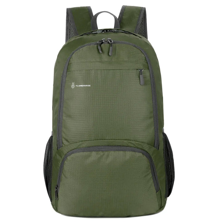 Sac à dos vert femme avec poches filet pour sorties nature.