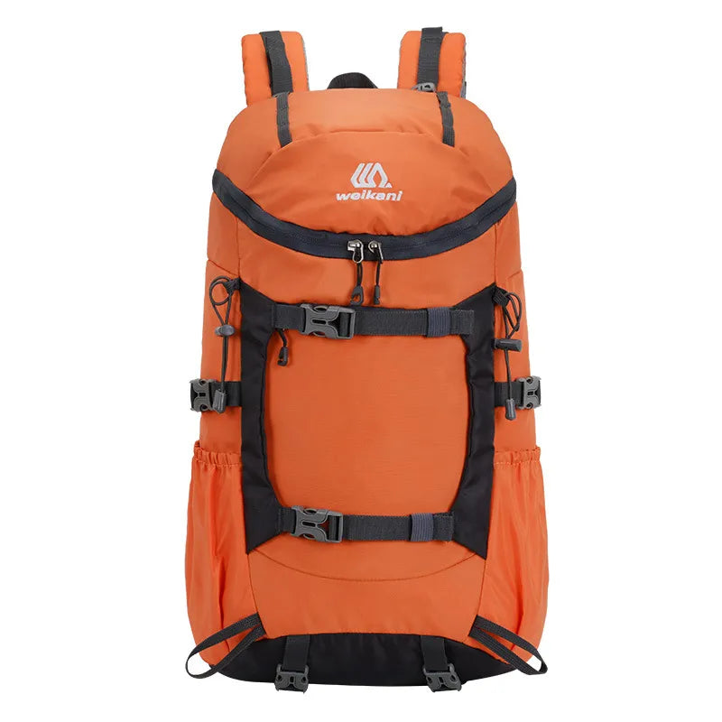 Sac à dos de randonnée orange 50L avec multiples poches et sangles de compression