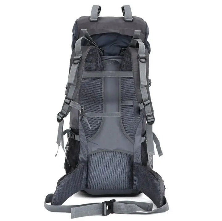 Vue latérale gauche du sac Flamehorse 60L, poches filet et sangles de compression visibles